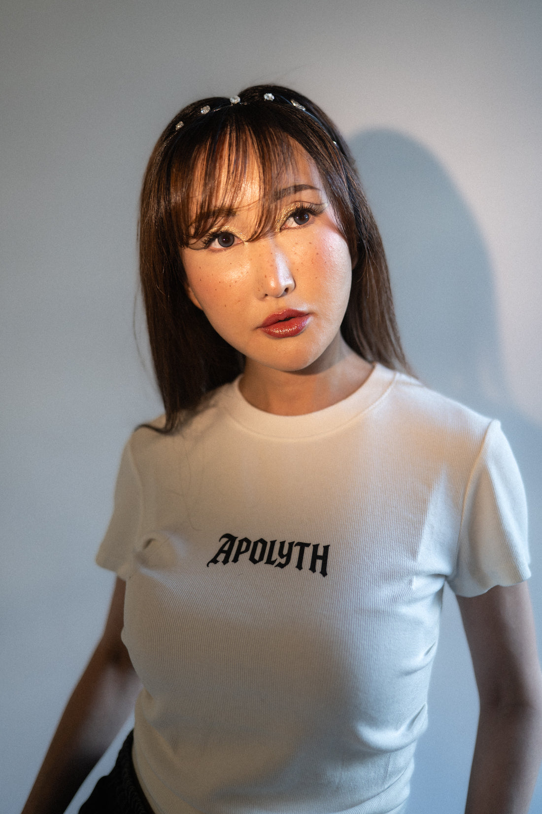 Angels Bodycon Light Tee in fitted white cotton jersey, lifestyle.